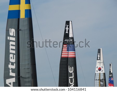 VENICE, ITALY - MAY 15: Four catamarans AC45 in the team bases area waiting for a new test in the Venice lagoon during the America's Cup previous races days in May 15, 2012 in Venice, Italy.