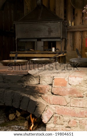 Rural outdoor kitchen with pots and pans