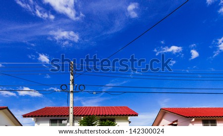 Electricity post in villages on sky background