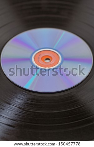vinyl record  disk and CD (Compact disk) on white background