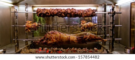 the grill roasted meat of pork, goat and chicken