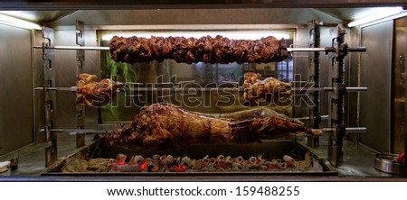 the grill roasted meat of pork, goat and chicken