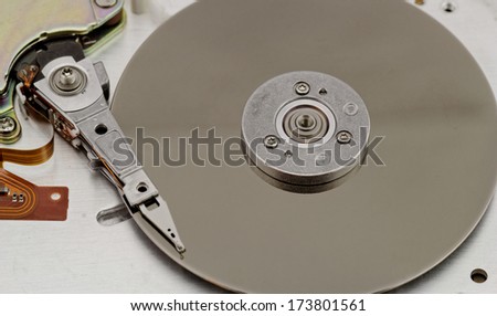 Open computer hard drive on white background (HDD, Winchester)