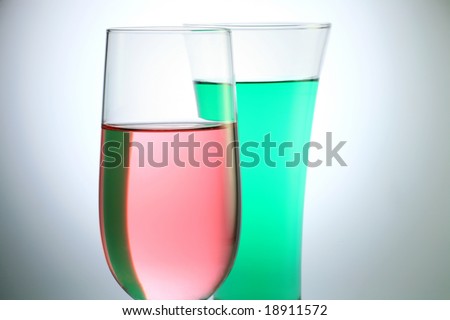 Glass with Pink and Green Color Juice