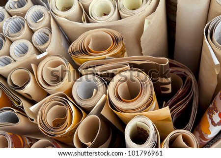Rolls of old wallpaper in a flea market