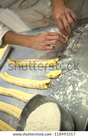 Chef making pastries in a bakery