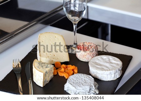 Cheese plate on a bistro table