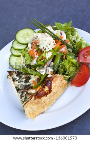 Pie with vegetables and salad for the brunch