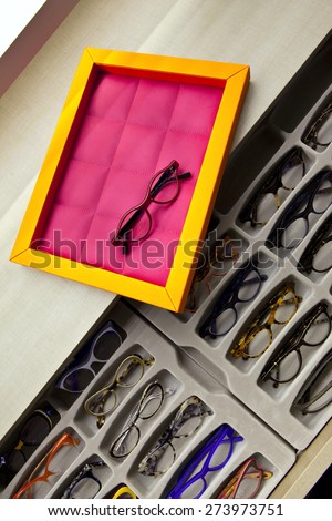 Various model of glasses in an optical shop