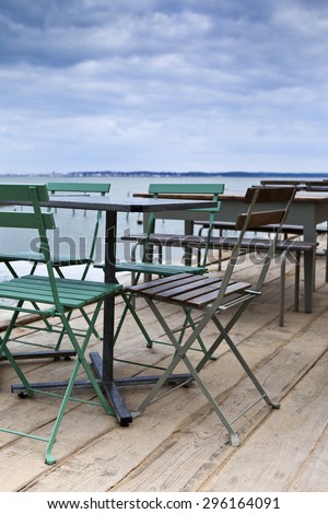 Terrace of a bistro facing the sea, in South-West of France