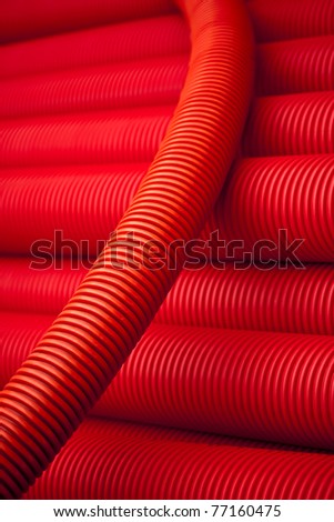 Closeup of red plastic pipes