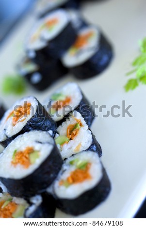 Sushi in a plate on a buffet