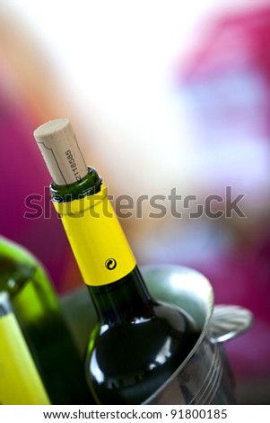 Bottle of Bordeaux wine in a bucket