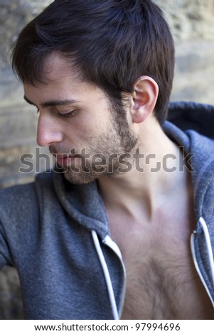 Portrait of a young hairy man