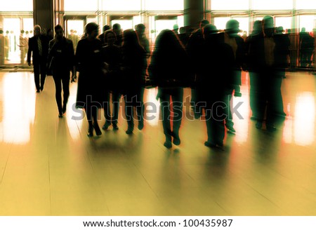 crowd silhouette inside modern building
