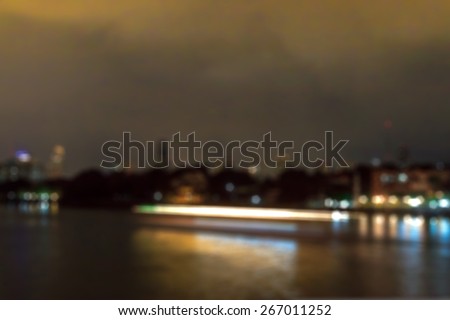Blur background of Bangkok night cityscape with shifted focus view 1