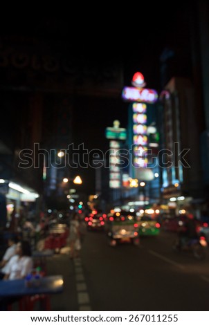 Blur background of Bangkok night cityscape with shifted focus view 2