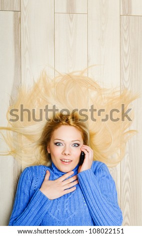 Young woman excited while chatting