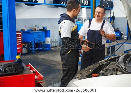 Mechanics at car service