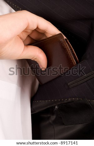 business man placing his wallet in pocket