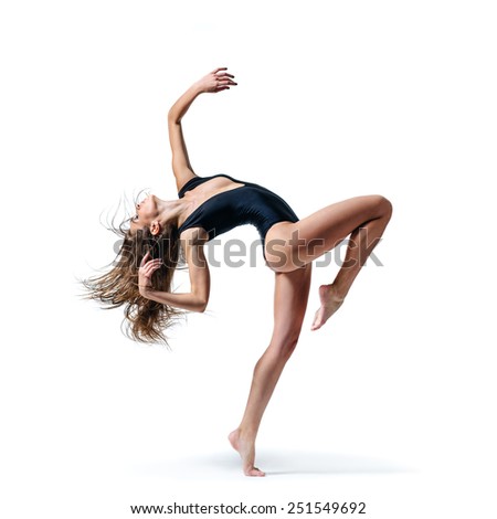 beautiful ballet dancer posing on a iwhite isolated background