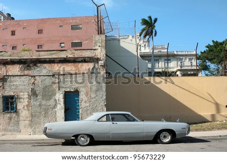 HAVANA - 30 MARCH: Vintage car in Cuba, Havana, March 30, 2007. October 2011, Cuban people finally got the right to trade on buying and selling cars. Ban on trade with cars was introduced in 1959.