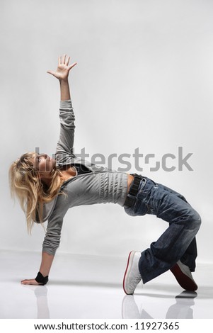 cool looking girl dances jazz modern dance