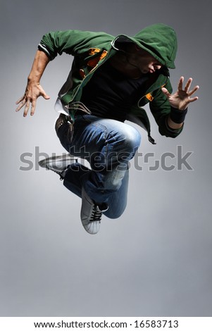 cool looking dancer makes a difficult jump
