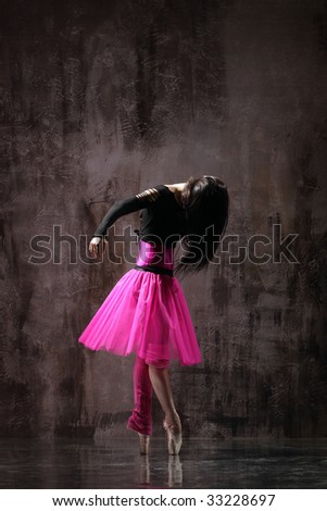 modern style dancer jumping on dirty grunge background