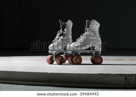 Old retro roller skates front view
