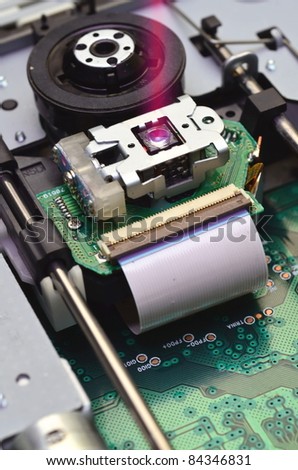 Close up shot of an optical device. This device usually operating inside a CD ROM or DVD device to read or write data.