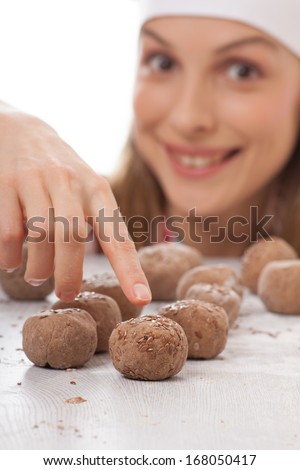 dough balls and woman chef cook