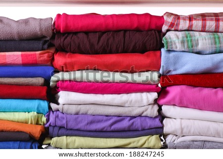 Pile of colorful clothes, stack of clothing
