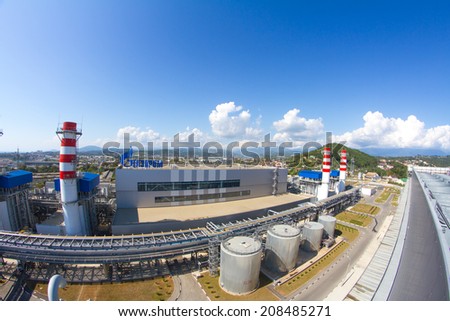 ADLER, RUSSIA - JUNE 26, 2013: Gazprom company logo on the roof of thermal power plant.