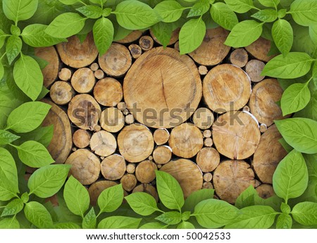 Stacked Logs Background with green plant frame