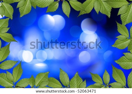 blue abstract background with green plant frame