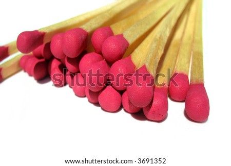 Close-up of group of matches, white background