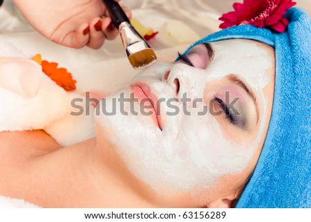 woman getting a beauty mask