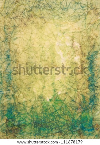 Paper with yellow, green, and brown paint abstract. Abstract border frame with vintage background texture design, luxurious paper or grunge wallpaper