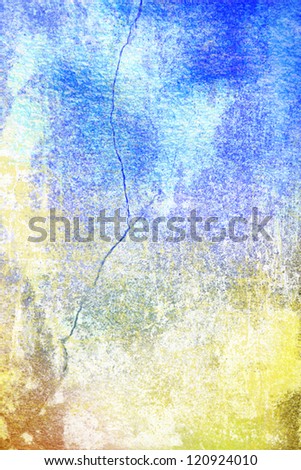 Abstract textured background: blue, yellow, and brown patterns on old scratched wall. For art texture, grunge design, and vintage paper / border frame