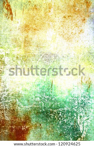 Abstract textured background: green, yellow, and brown patterns on old scratched wall. For art texture, grunge design, and vintage paper / border frame