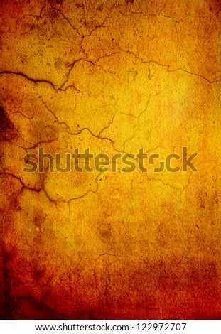 Old shabby wall: Abstract textured background with red, brown, and orange patterns on yellow backdrop. For art texture, grunge design, and vintage paper / border frame