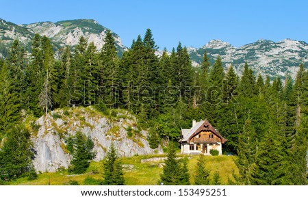 Lonely cottage in high mountains