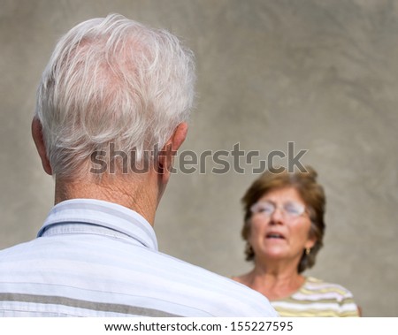 Elder man and woman chatting