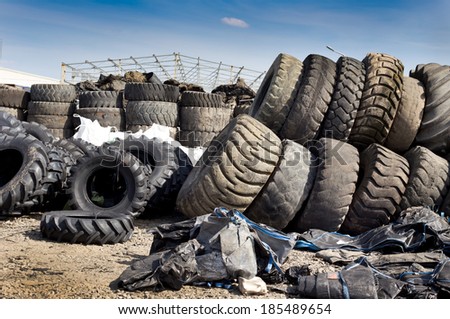 Bunch of old used tires stocked for recycling