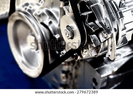 Close up of transmission belt on car engine