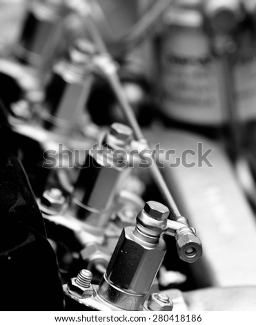 Close up of fragment of automobile engine, black and white image