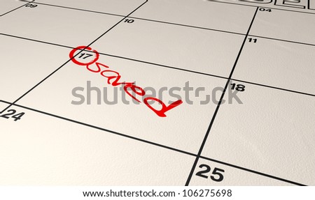 A calendar with with the date circled  and the word saved written in red marker pen
