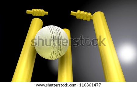 A white leather cricket ball hitting yellow cricket wickets in the nighttime