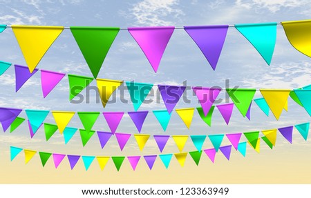 Regular strands of fairground bunting flags in various colors on a blue sky background